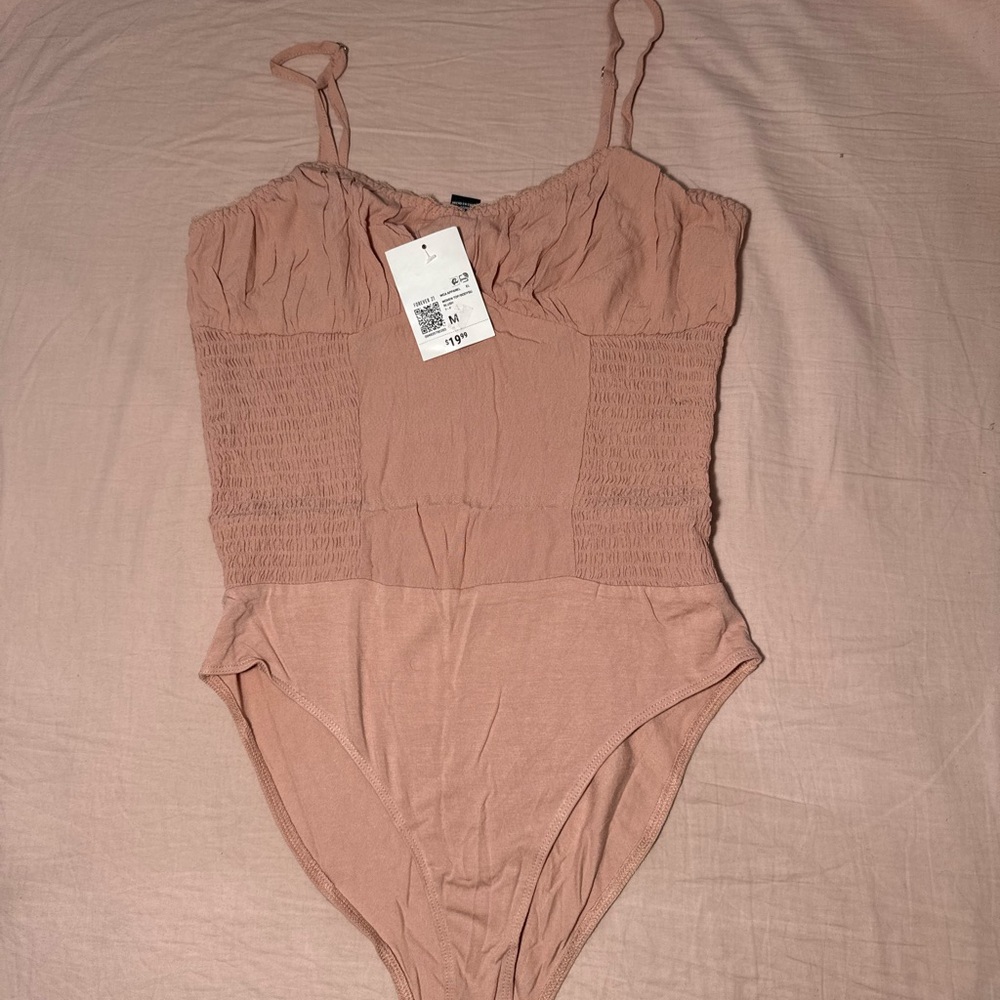Forever 21 Women's Bodysuit in Soft Pink